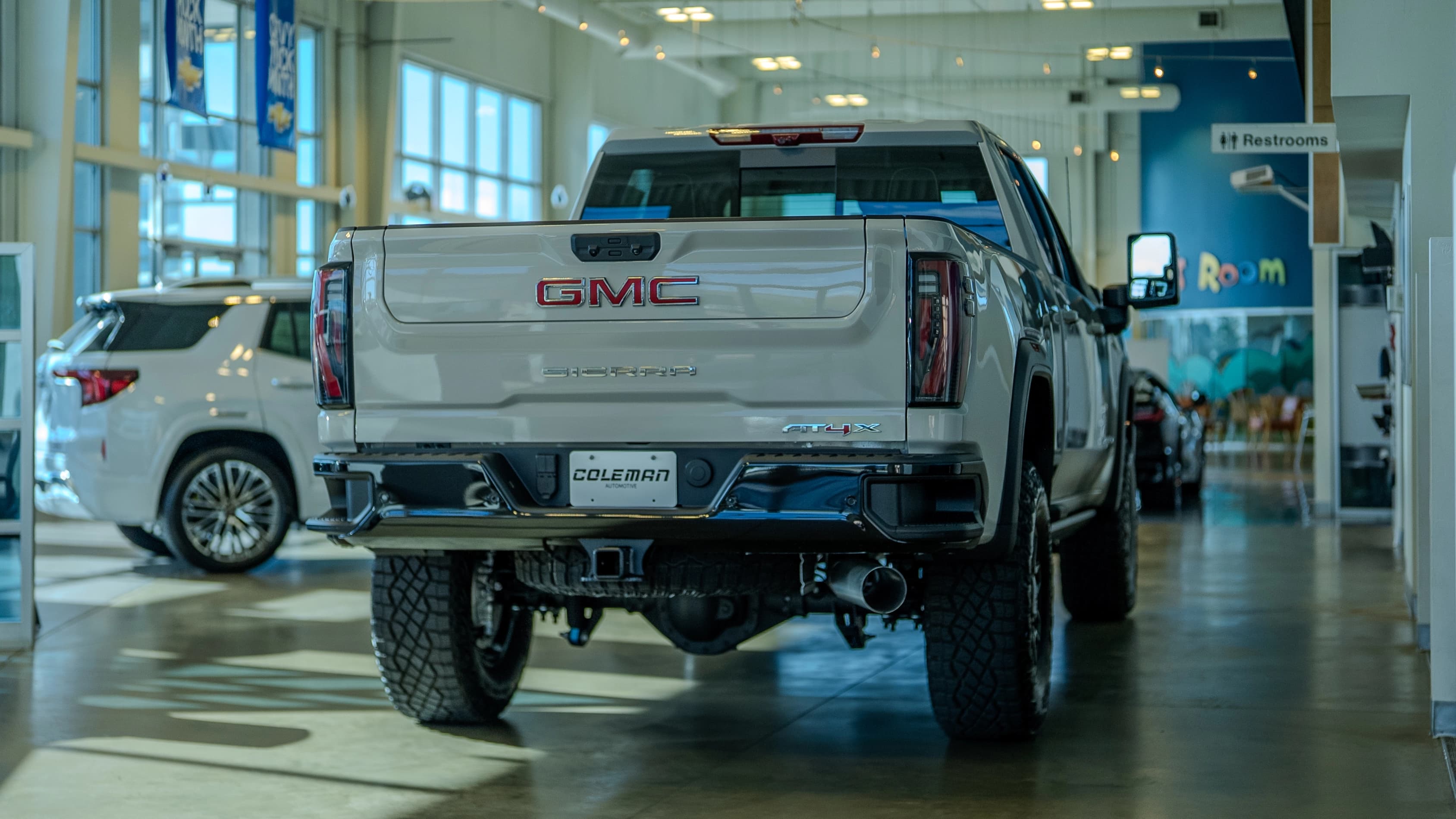 Operational infrastructure at a Coleman Automotive dealership generating the cash flow that powers the flywheel